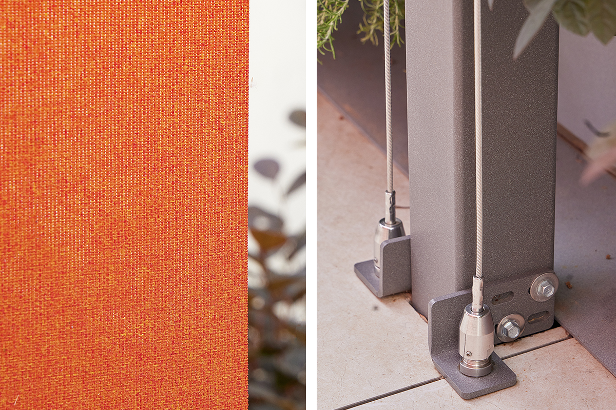 Dettaglio del tessuto delle schermature solari arancioni con ingranaggio a terra